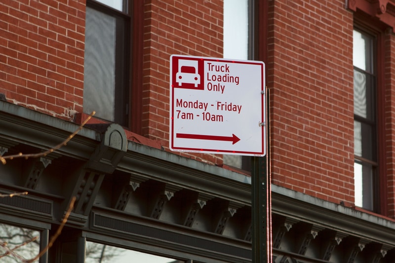 Parking sign reading Truck Loading Zone in Brooklyn, New York City